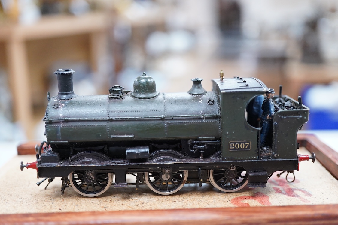 Two EM gauge scratch built model railway GWR locomotives by John Worsley, an 0-6-0PT, 1961, and an 0-6-0ST, 2007, both detailed models with opening smoke box doors showing the details of the blast pipe and boiler tube en
